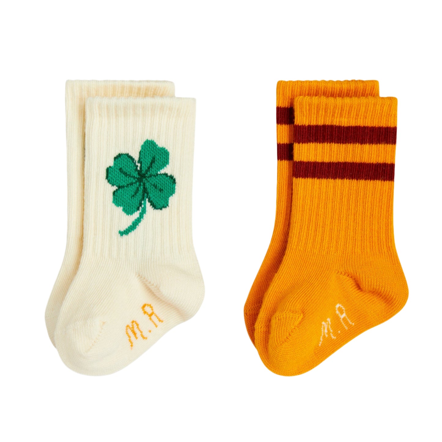 Two pairs of socks, one with a clover design and the other with stripes, on a white background.