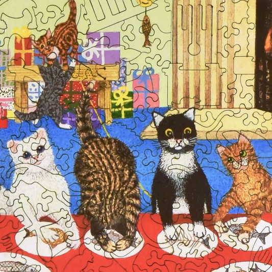 Jigsaw puzzle with cats on a table, featuring a completed section and missing pieces.