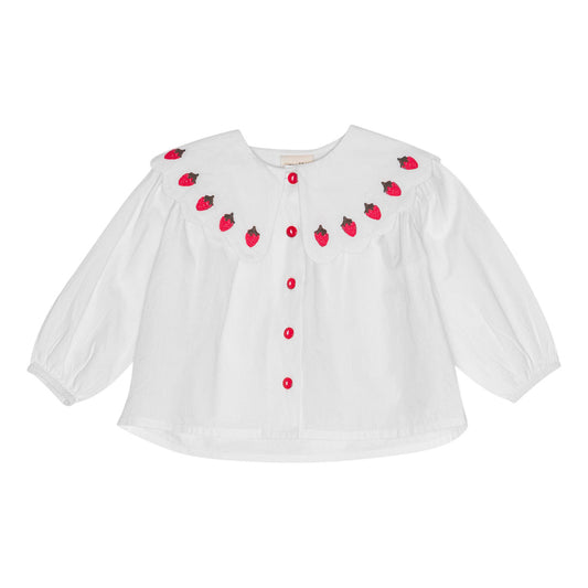 White blouse with strawberry patterns on a white background