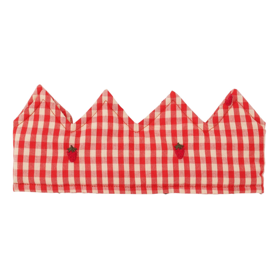 Red and white checkered bikini top with strawberry details on a white background