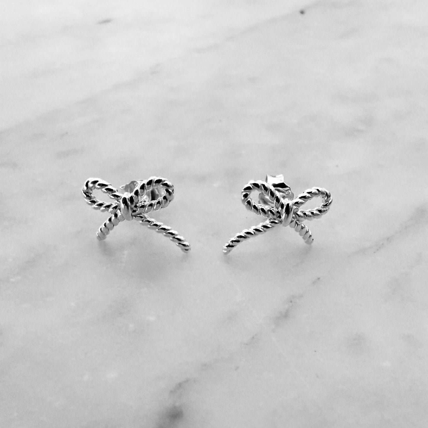 STERLING SILVER BOW STUD EARRINGS