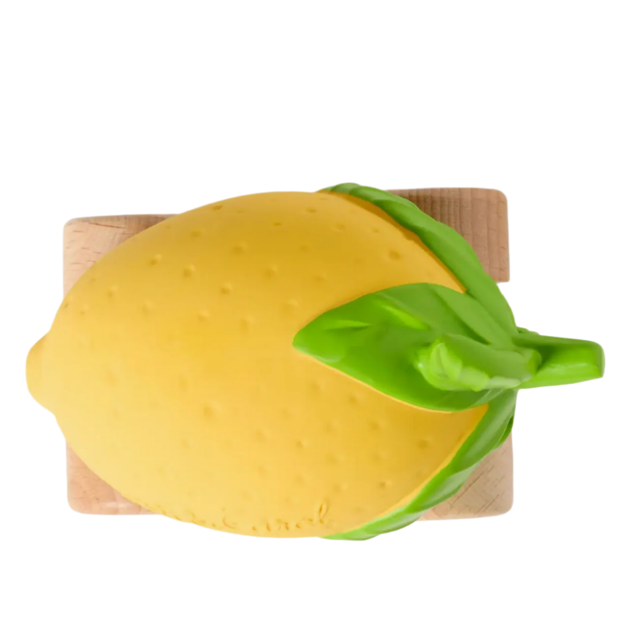 Yellow lemon-shaped object with a green handle on a wooden board against a white background