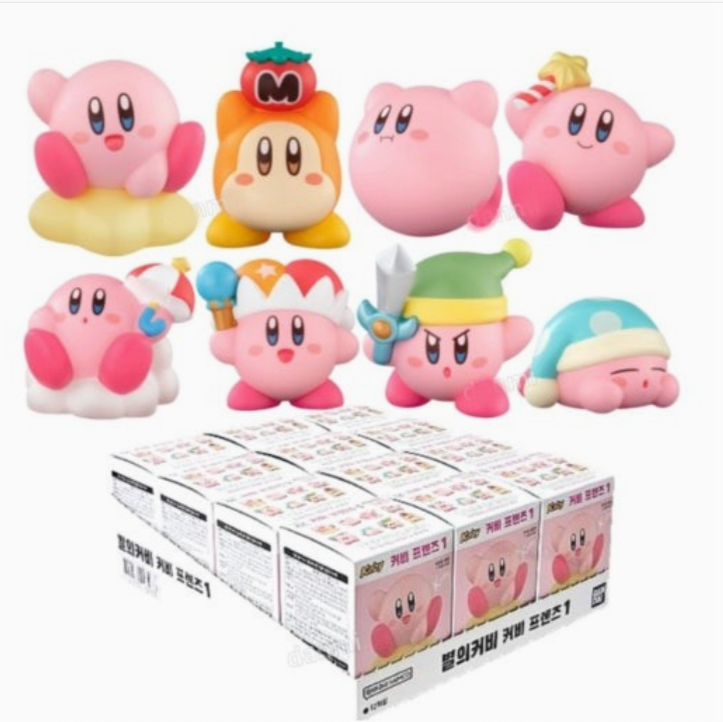 Set of Kirby figurines with various hats on a white background