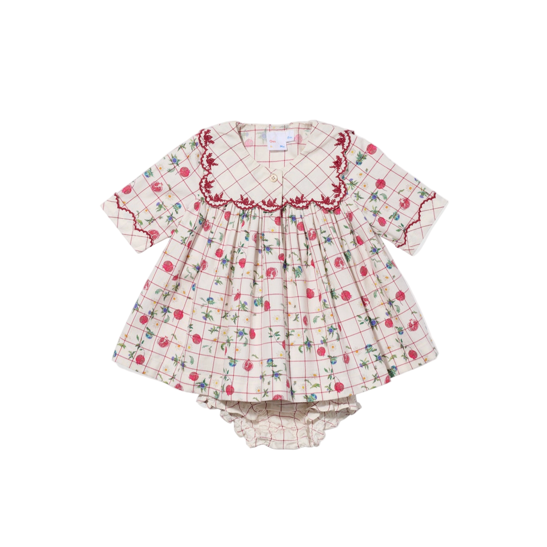 Children's dress with floral and checkered pattern on a white background