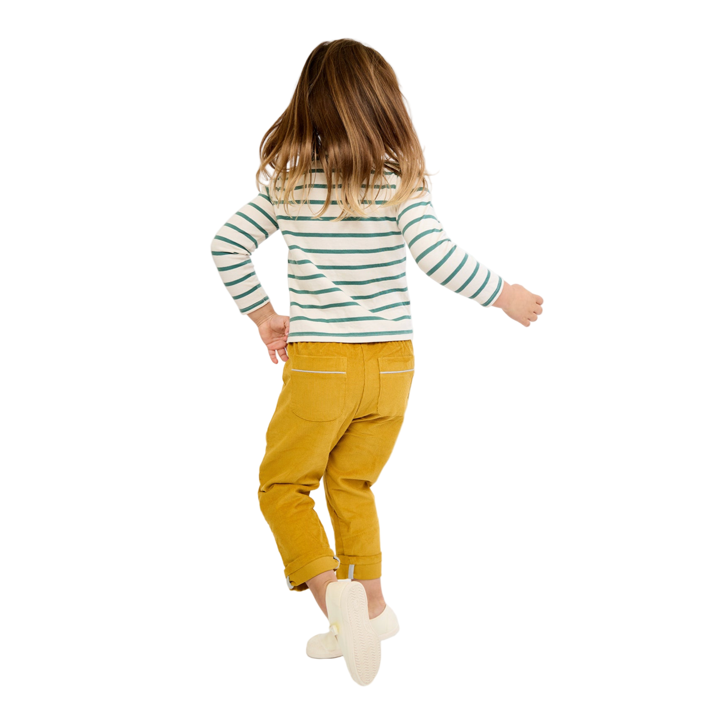Child wearing a striped shirt and yellow pants on a white background