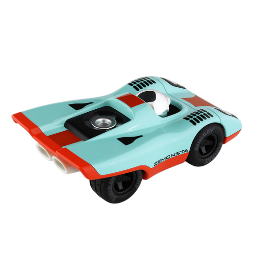 Toy car with a turquoise body and red accents on a white background