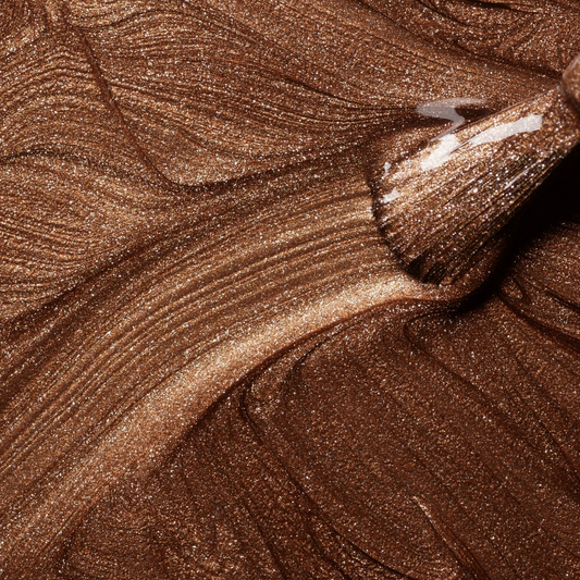 Close-up of brown glittery makeup swatch