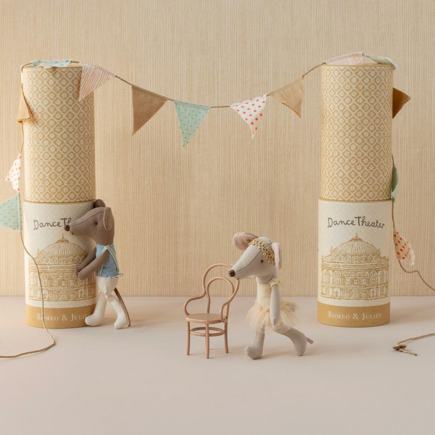 Two cylindrical products with labels on a neutral background