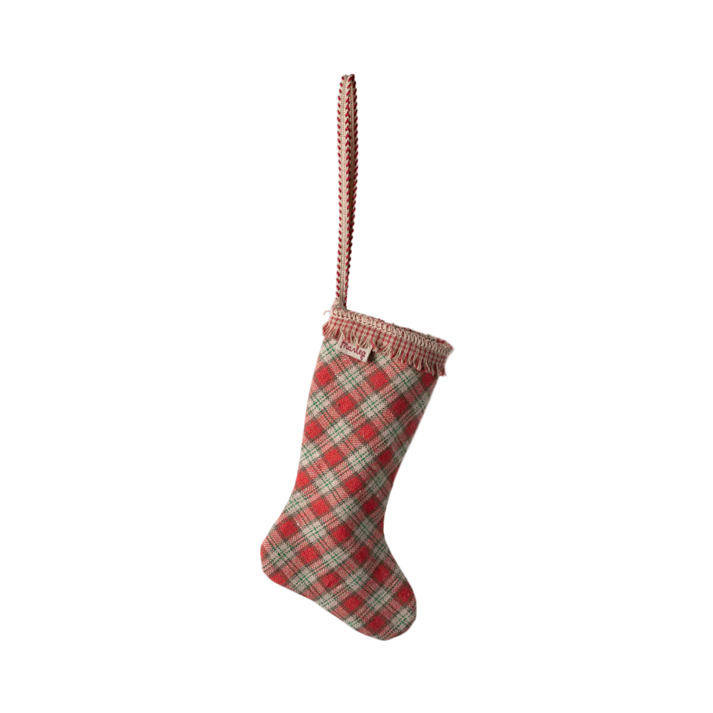 Red and green plaid Christmas stocking on a white background