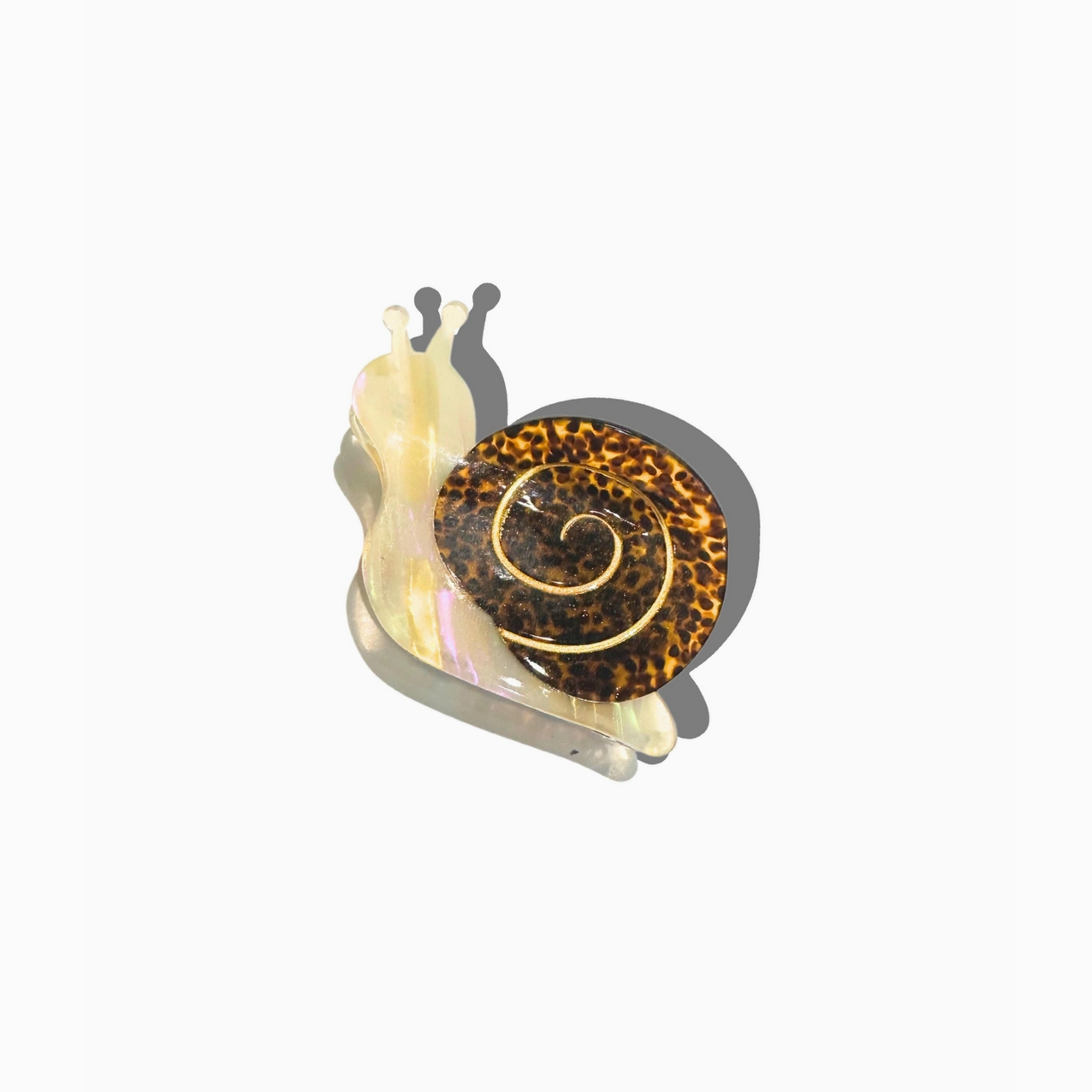 Decorative snail with leopard print shell on a white background