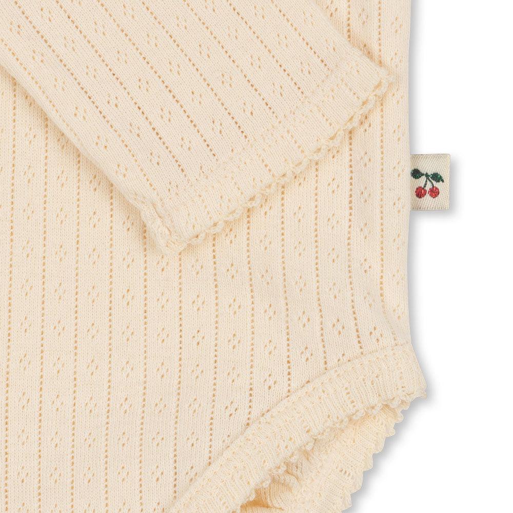 MINNIE GOTS LONG SLEEVE ONESIE - BUTTERCREAM